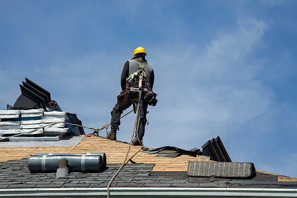 Professional Roof Replacement technician working in Hague, NY